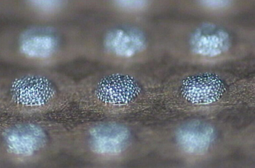 Photomicrograph of fine-feature solder paste deposits produced at 200mm/sec soldering print speed.